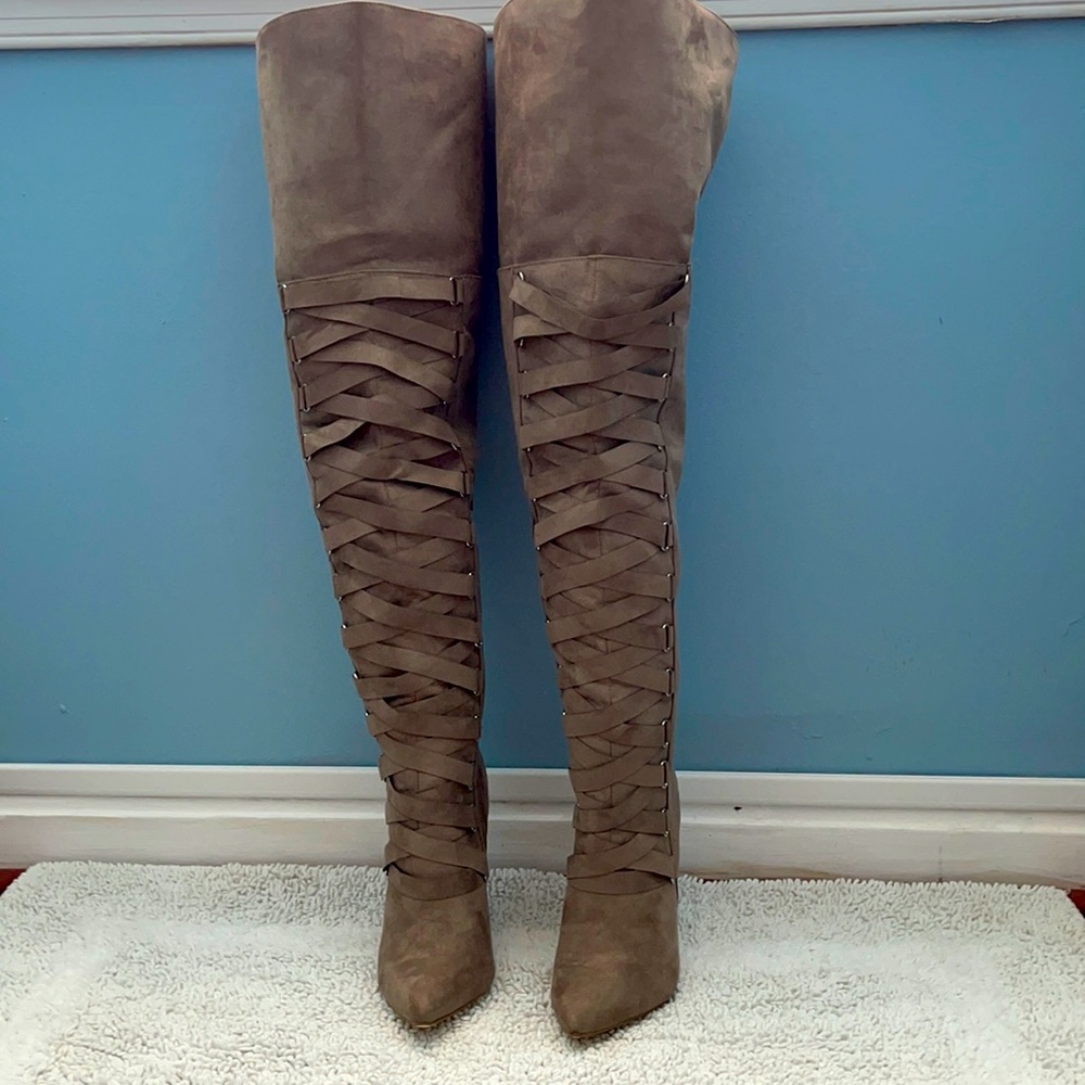 Thigh high heeled boots